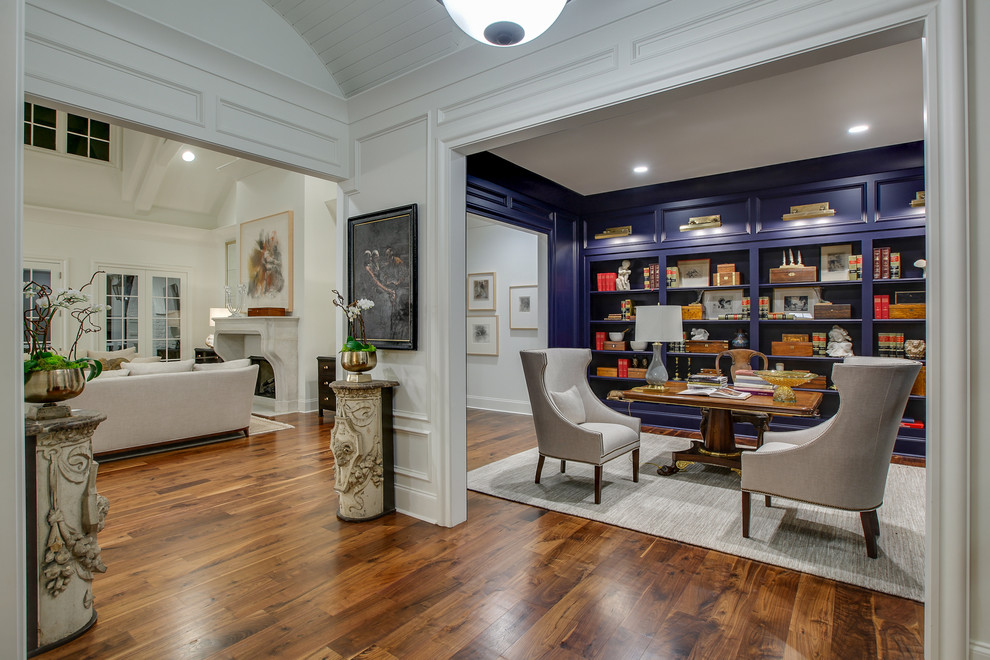 Inspiration for a traditional study room in Nashville with dark hardwood floors, a freestanding desk and brown floor.