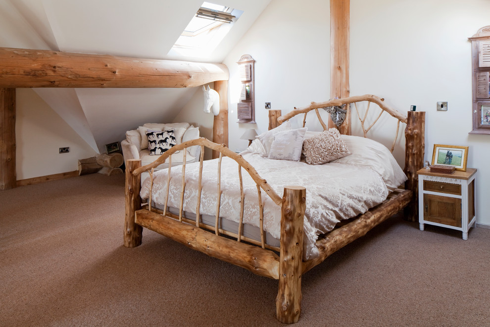 This is an example of a country bedroom in West Midlands.