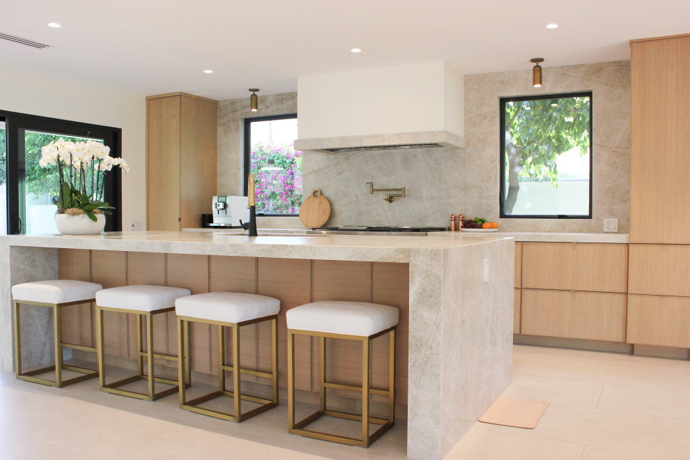 This is an example of a mid-sized contemporary single-wall kitchen pantry in Orange County with an undermount sink, shaker cabinets, brown cabinets, laminate benchtops, grey splashback, ceramic splashback, stainless steel appliances, ceramic floors, with island, white floor, white benchtop and vaulted.