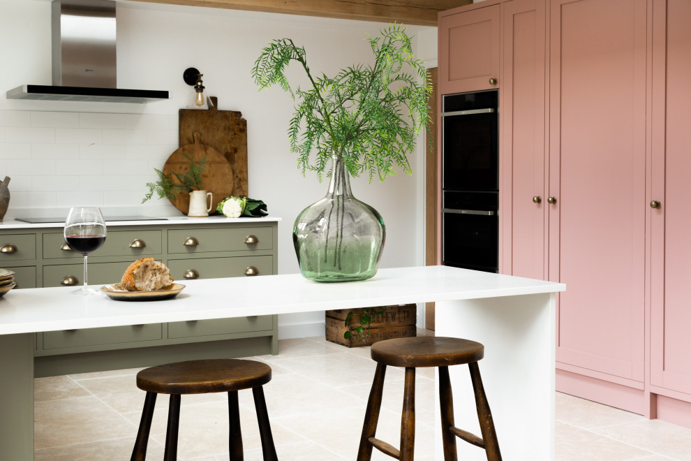 Design ideas for a large contemporary l-shaped eat-in kitchen in Kent with shaker cabinets, pink cabinets, quartzite benchtops and white benchtop.