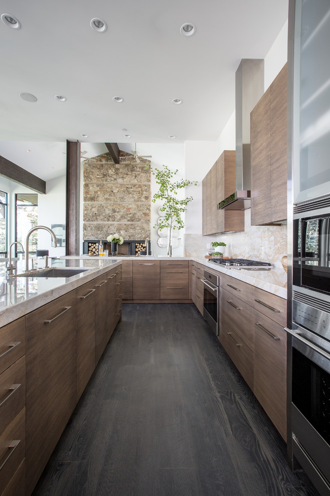 Design ideas for a contemporary open plan kitchen in Salt Lake City with an undermount sink, flat-panel cabinets, medium wood cabinets, beige splashback, stainless steel appliances, dark hardwood floors and with island.