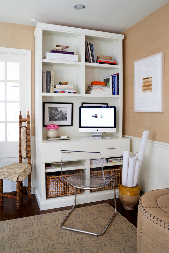 Inspiration for a small transitional home office in DC Metro with dark hardwood floors, no fireplace, a freestanding desk, brown floor and beige walls.