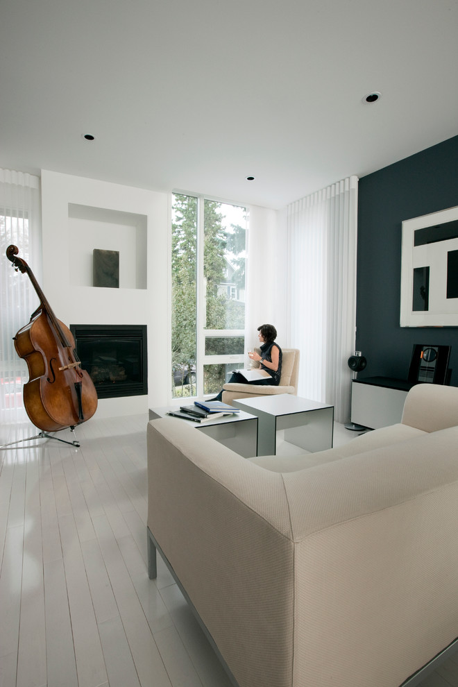 Inspiration for a contemporary living room in Calgary with painted wood floors and white floor.