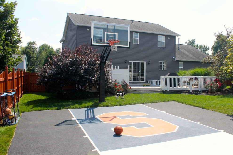 Design ideas for a large traditional backyard partial sun outdoor sport court in New York.