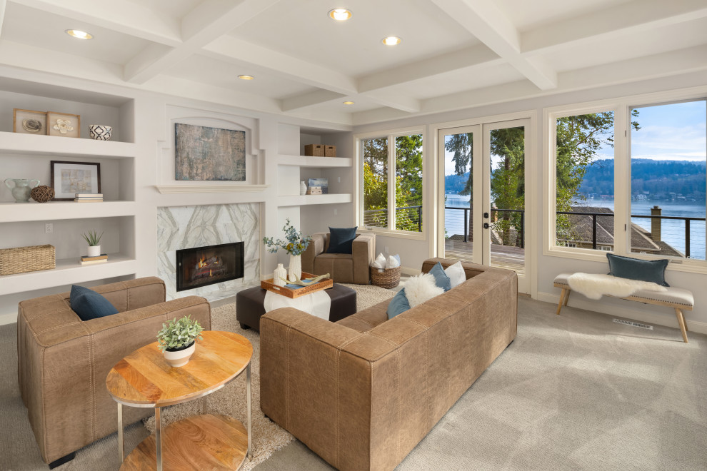 Large transitional open concept family room in Seattle with carpet, a standard fireplace, a stone fireplace surround, grey floor, grey walls and exposed beam.