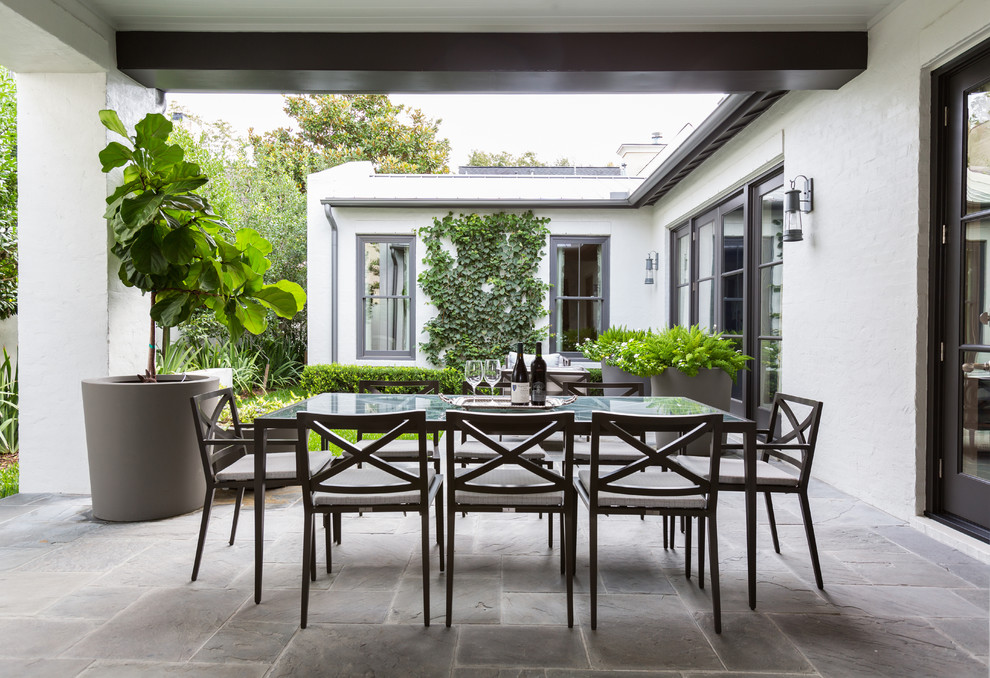 Inspiration for a transitional patio in Houston.