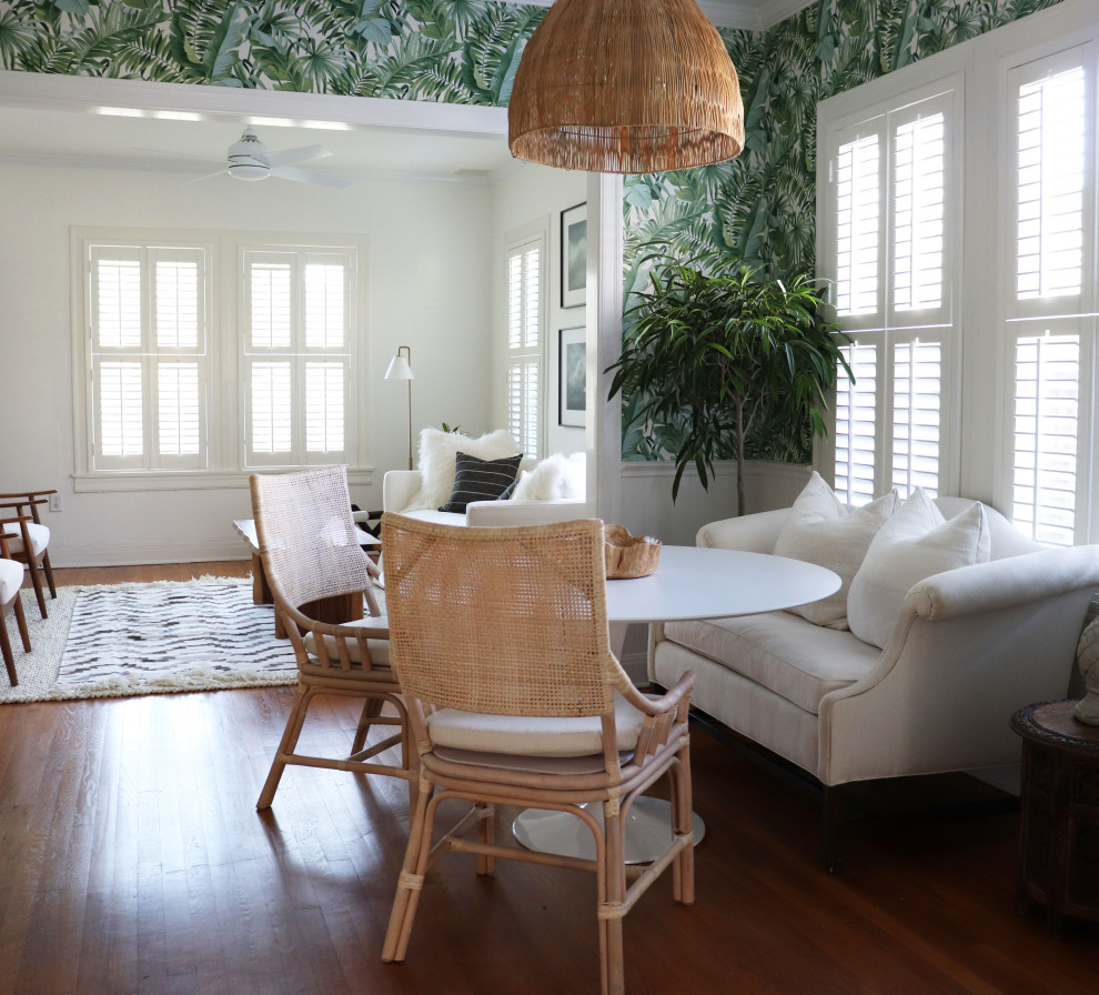 Inspiration for a mid-sized transitional light wood floor and wallpaper breakfast nook remodel in Austin with green walls