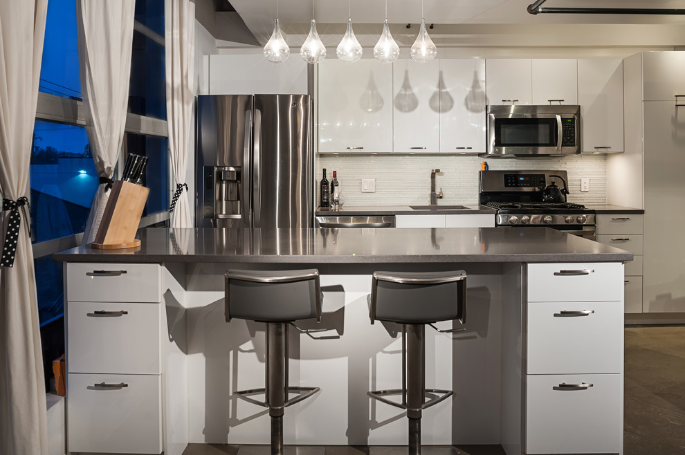 This is an example of a contemporary single-wall kitchen in Vancouver.