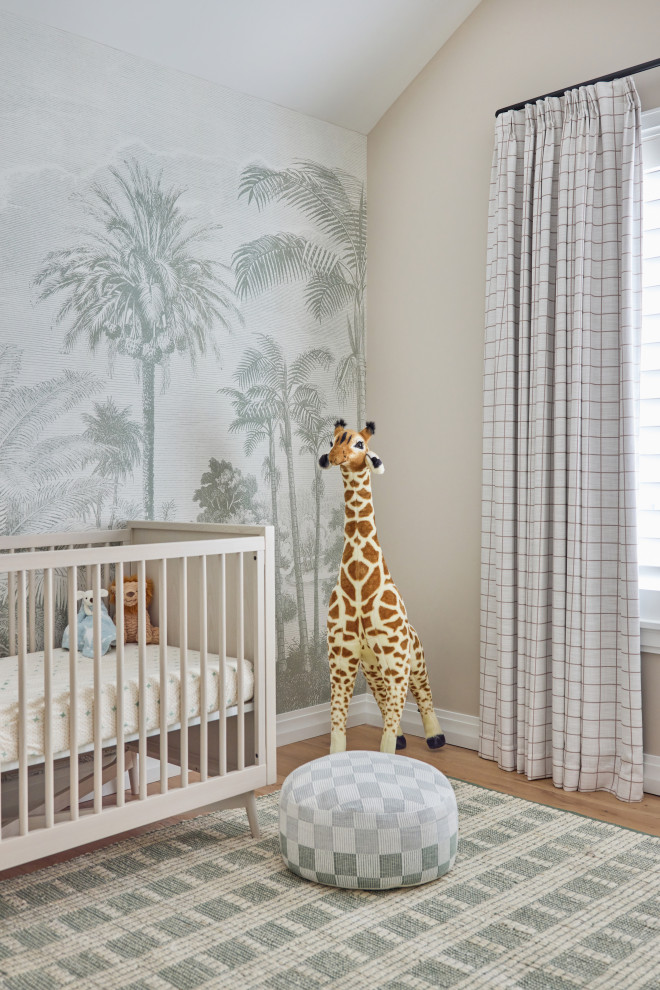 Nursery - coastal gender-neutral vaulted ceiling and wallpaper nursery idea in Jacksonville with beige walls