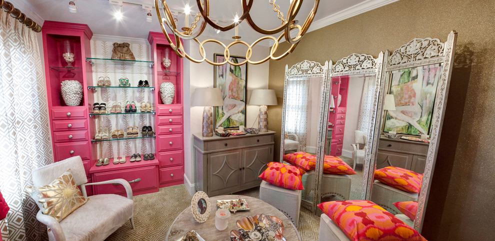 Inspiration for a mid-sized eclectic women's dressing room in Charleston with raised-panel cabinets, red cabinets and carpet.