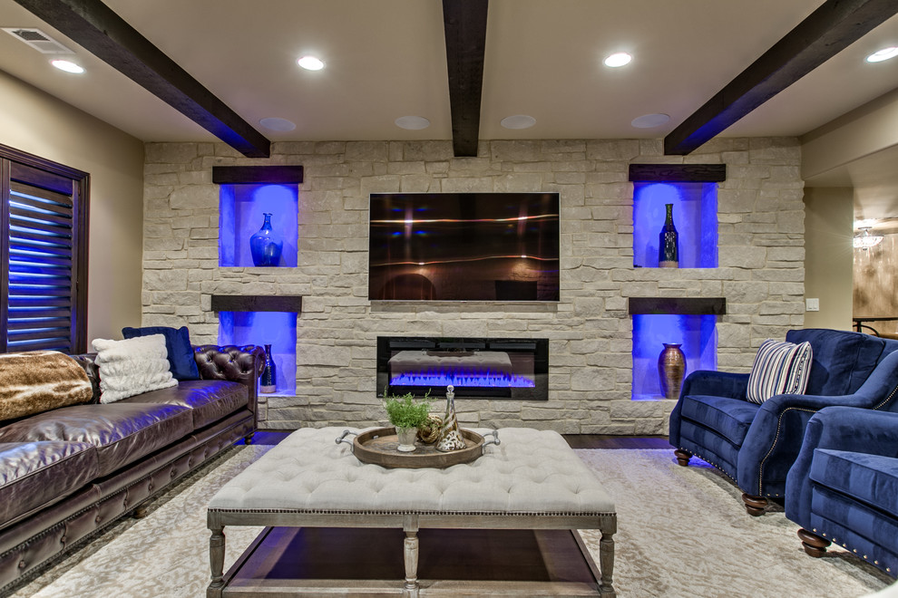 Design ideas for a traditional walk-out basement in Omaha with a ribbon fireplace and a stone fireplace surround.