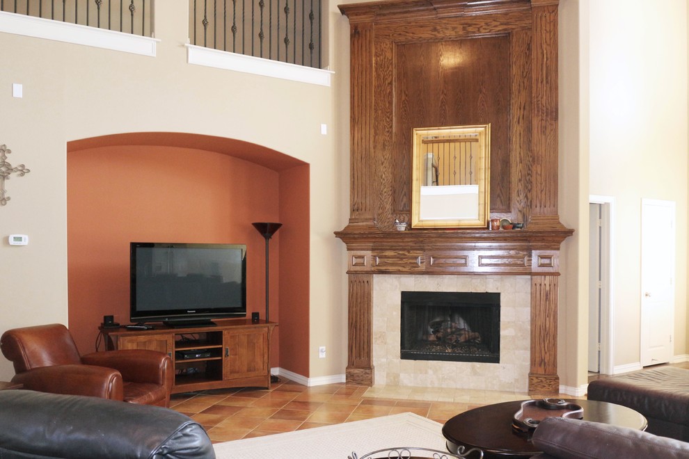 Photo of a large transitional open concept family room in Dallas with multi-coloured walls, ceramic floors, a corner fireplace, a tile fireplace surround, a freestanding tv and multi-coloured floor.
