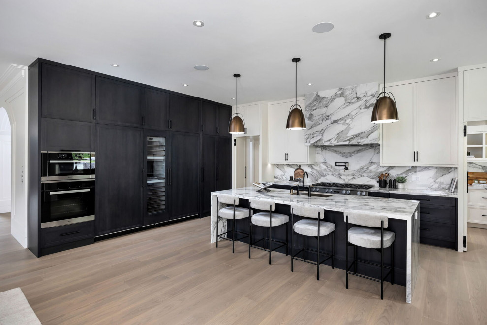 Example of a transitional kitchen design in Toronto