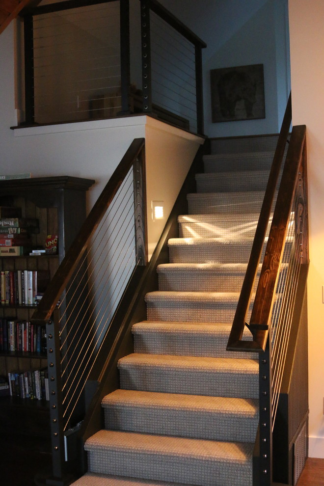 Example of a large urban staircase design in Raleigh