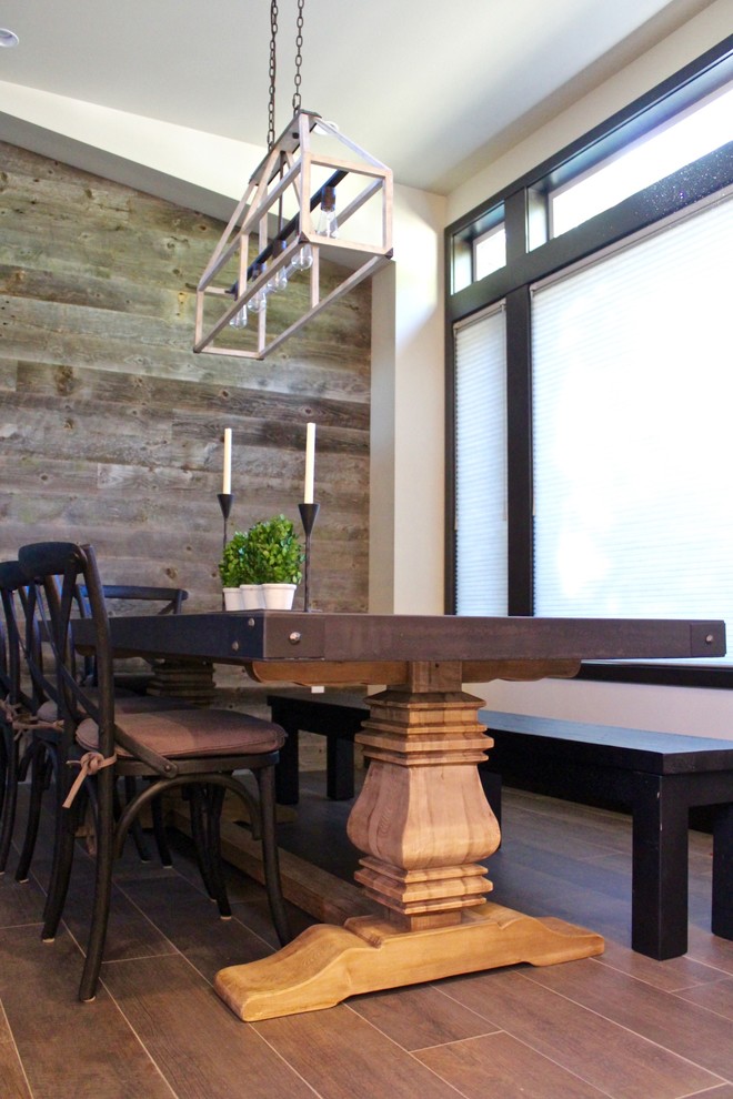 Inspiration for a country kitchen/dining combo in Austin with beige walls and dark hardwood floors.