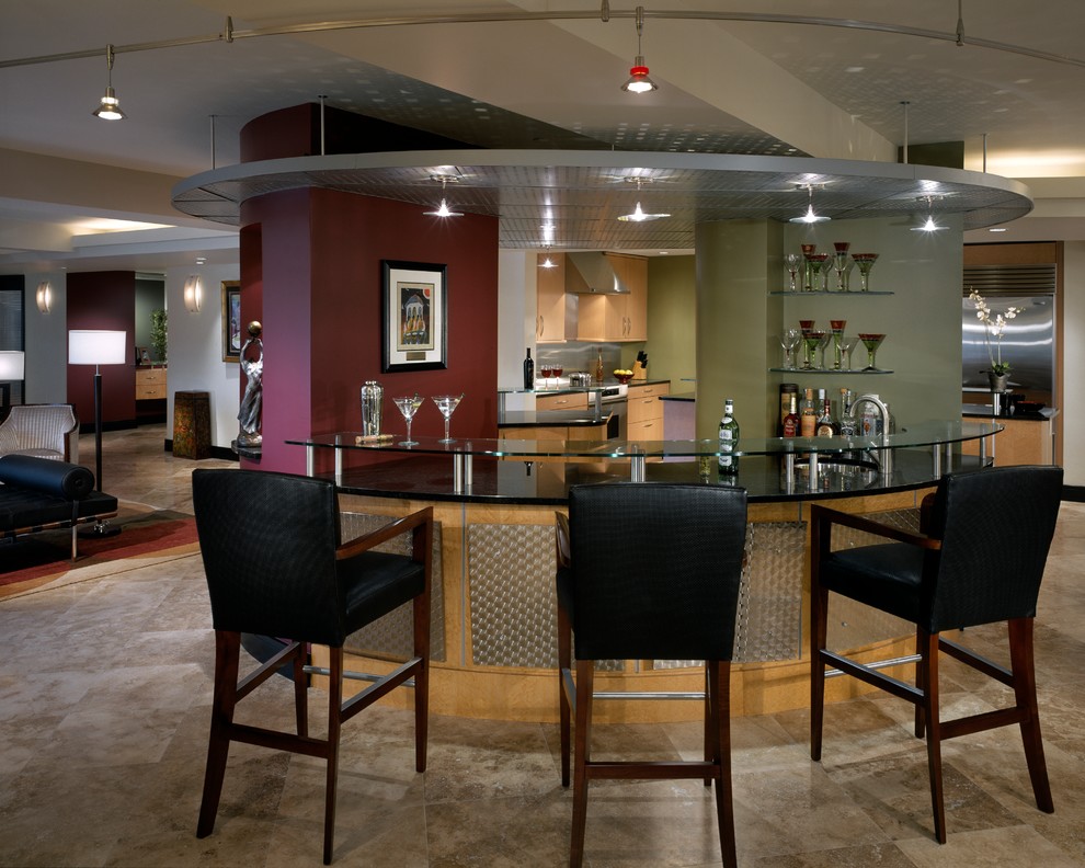 Design ideas for a large eclectic u-shaped seated home bar in Other with an undermount sink, glass benchtops, limestone floors and open cabinets.