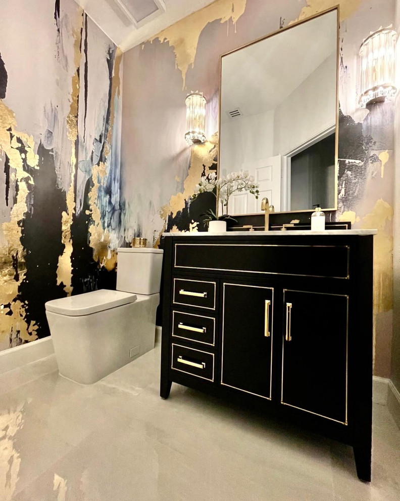 Inspiration for a large modern marble floor, beige floor and wallpaper powder room remodel in Columbus with flat-panel cabinets, black cabinets, granite countertops, white countertops and a freestanding vanity
