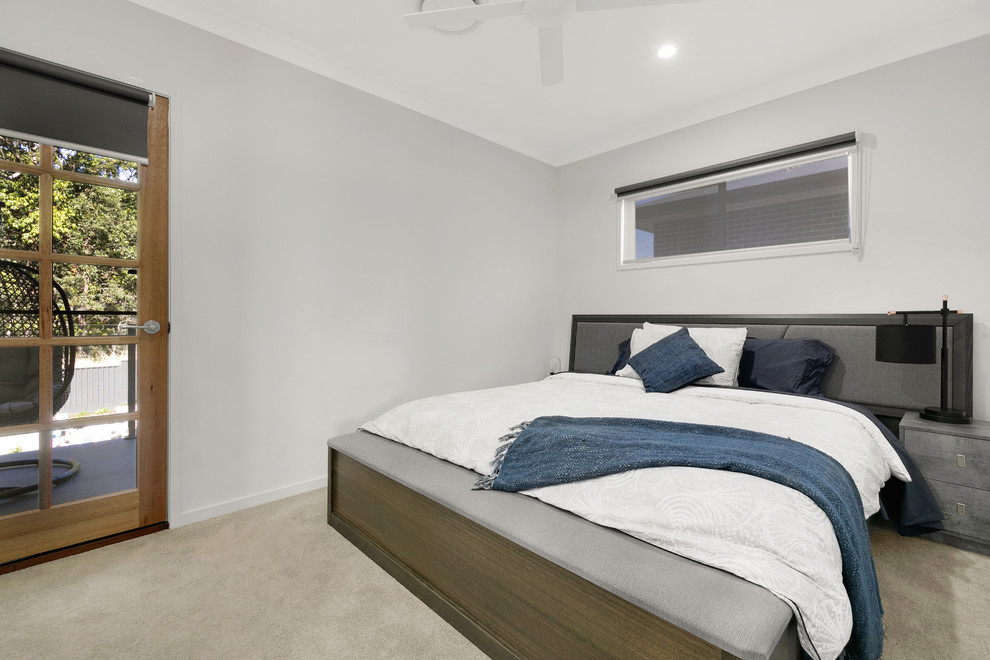Design ideas for a contemporary bedroom in Brisbane.