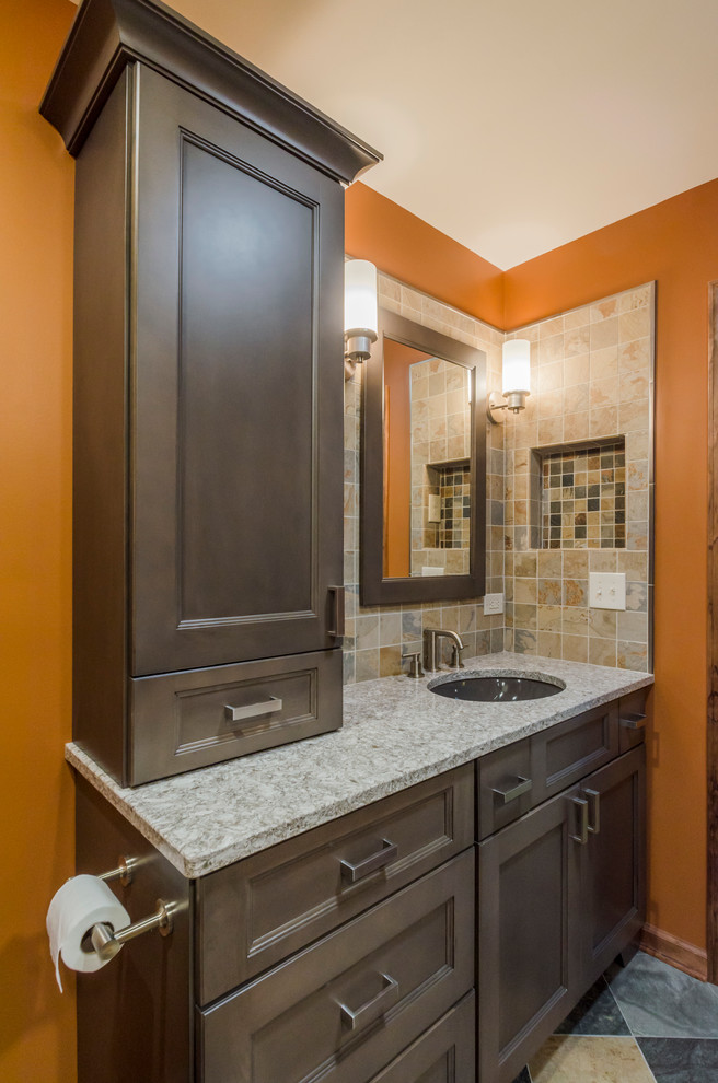 Mid-sized asian master bathroom in Chicago with an undermount sink, recessed-panel cabinets, grey cabinets, engineered quartz benchtops, an alcove shower, a two-piece toilet, multi-coloured tile, porcelain tile, orange walls and porcelain floors.