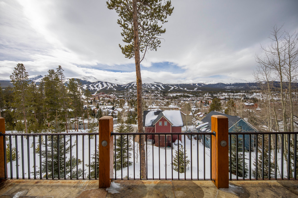 Mountain style home design photo in Denver
