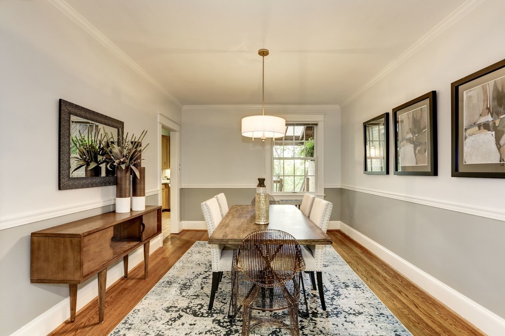 This is an example of a mid-sized contemporary separate dining room in DC Metro with grey walls, light hardwood floors, no fireplace and beige floor.