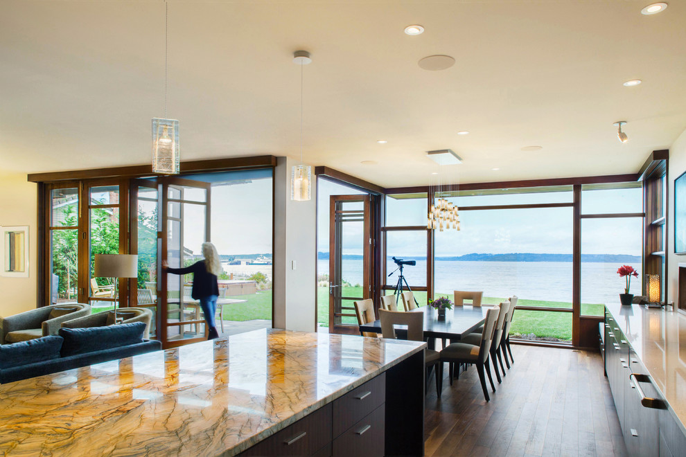 Contemporary kitchen/dining combo in Seattle with medium hardwood floors.