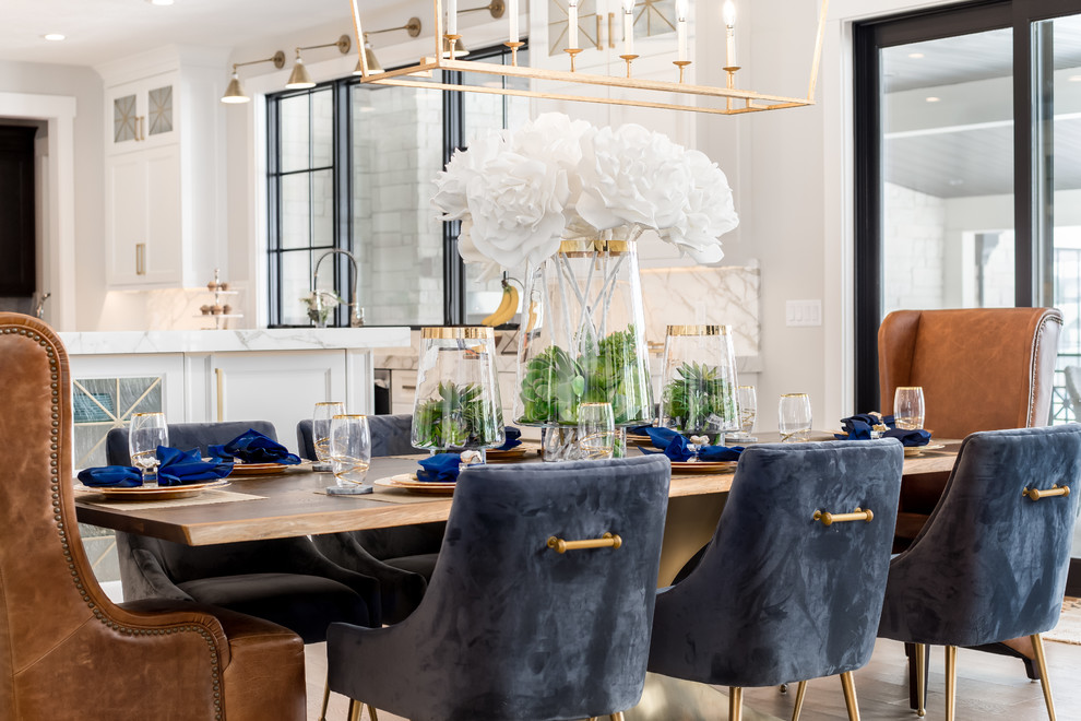 Inspiration for a mid-sized transitional open plan dining in Salt Lake City with white walls, light hardwood floors, no fireplace and beige floor.