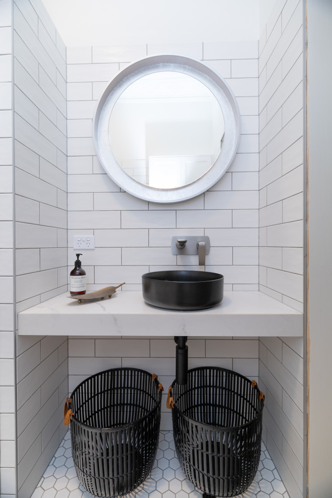 Photo of a small contemporary 3/4 bathroom in Sydney with white tile, porcelain tile, white walls, porcelain floors, a vessel sink, tile benchtops, white floor, white benchtops and a single vanity.