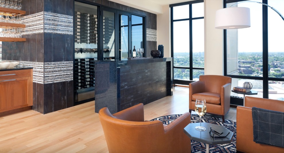 Photo of a mid-sized transitional single-wall home bar in Minneapolis with glass-front cabinets, medium wood cabinets, recycled glass benchtops, grey splashback and mirror splashback.