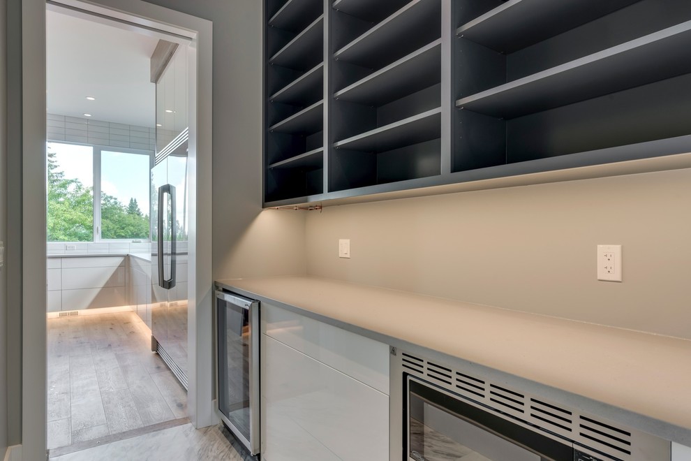 Transitional home design photo in Calgary