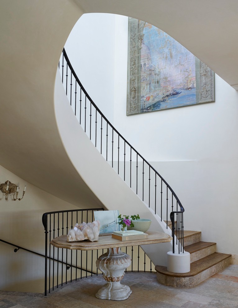 Mediterranean curved staircase in Orange County.