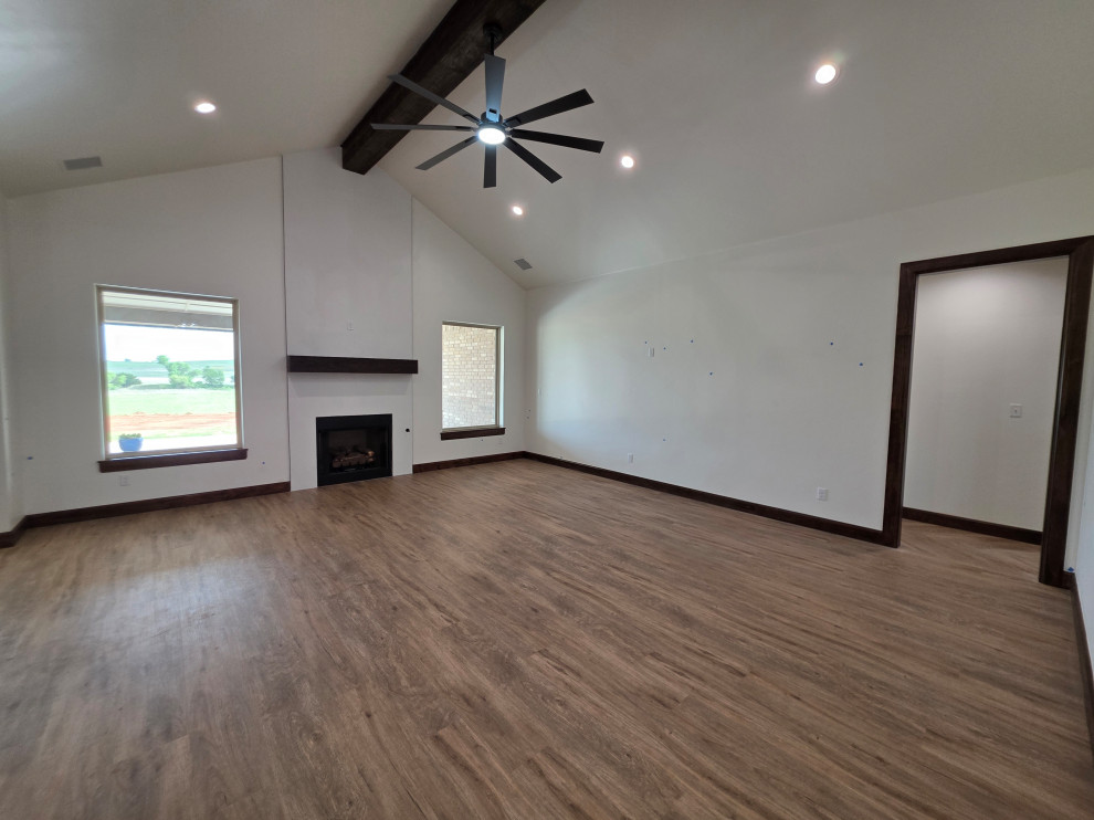 Great room with beam & vaulted ceilings