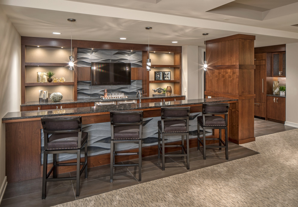 Design ideas for a transitional home bar in Omaha.