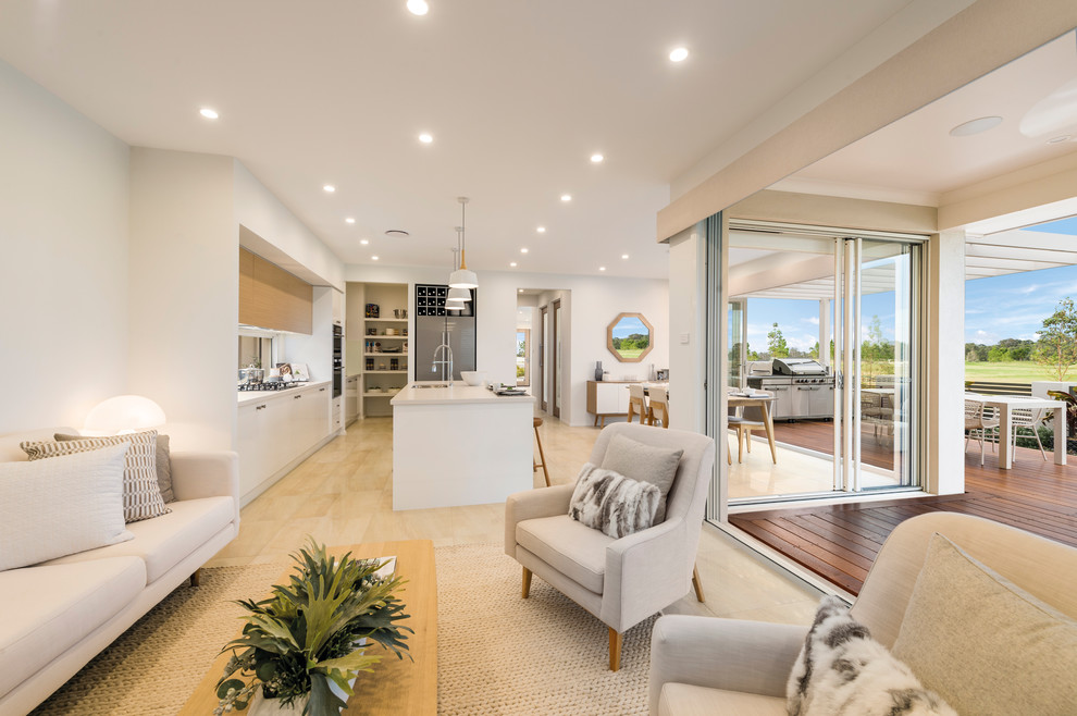 Inspiration for an expansive beach style open concept living room in Sydney with white walls, ceramic floors, no fireplace, no tv and yellow floor.