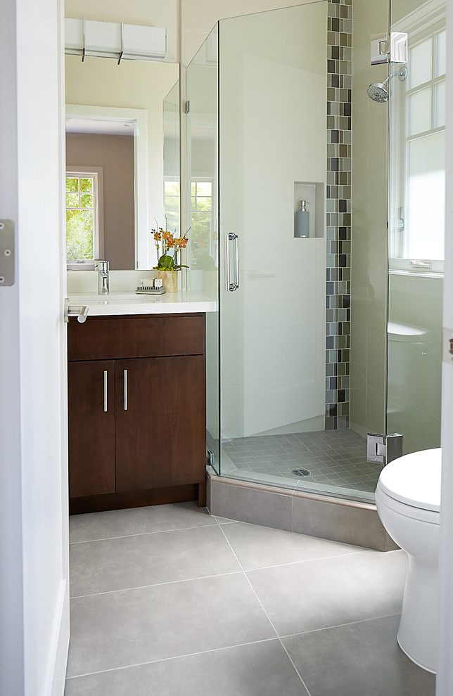 Small contemporary bathroom in San Francisco with flat-panel cabinets, dark wood cabinets, gray tile, porcelain tile, grey walls, porcelain floors and engineered quartz benchtops.