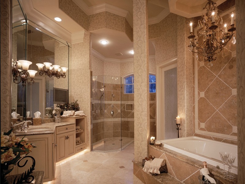 This is an example of a mid-sized transitional master bathroom in Kansas City with distressed cabinets, a drop-in tub, a double shower, brown tile, ceramic tile, brown walls, ceramic floors, an undermount sink and engineered quartz benchtops.
