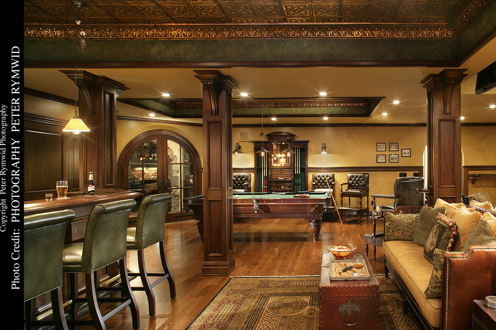 Pub Bar, Seating, and Pool Table Basement New York by Carisa