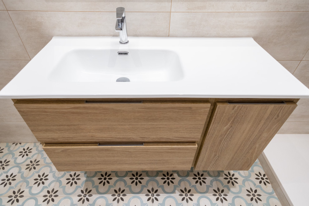 Inspiration for a mid-sized mediterranean master bathroom in Barcelona with flat-panel cabinets, medium wood cabinets, a curbless shower, a one-piece toilet, beige tile, ceramic tile, ceramic floors, a trough sink, beige floor, an open shower, white benchtops, an enclosed toilet, a single vanity and a floating vanity.