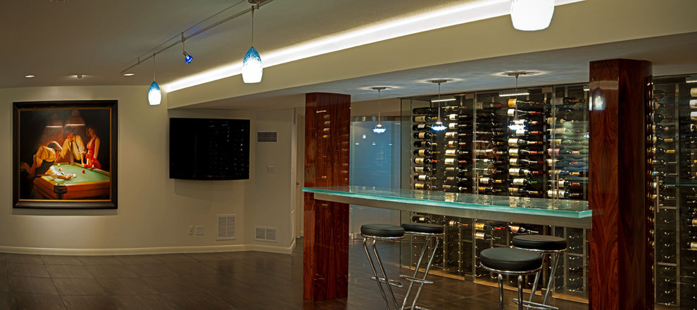 Design ideas for a large contemporary wine cellar in Wichita with vinyl floors, display racks and black floor.