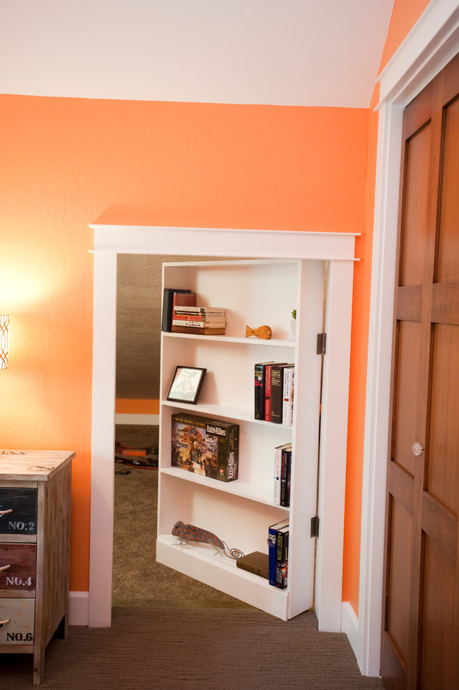 Design ideas for a mid-sized eclectic guest bedroom in Other with orange walls and carpet.