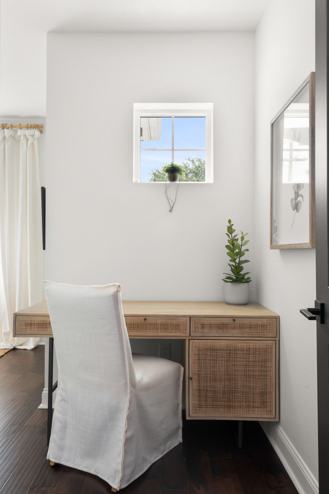 Design ideas for a small beach style home office in Tampa with white walls, dark hardwood flooring, no fireplace, a freestanding desk and brown floors.