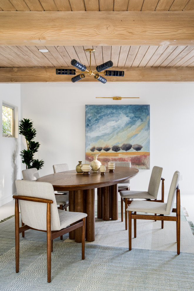 Photo of a midcentury dining room in Orange County.