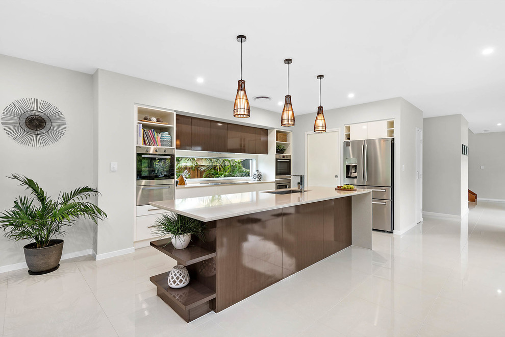 Photo of a contemporary l-shaped kitchen in Gold Coast - Tweed with an undermount sink, flat-panel cabinets, dark wood cabinets, window splashback, stainless steel appliances, with island and beige floor.