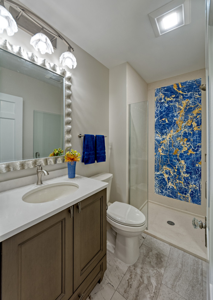 Small transitional 3/4 beige tile and porcelain tile porcelain tile, multicolored floor and single-sink bathroom photo in Minneapolis with shaker cabinets, medium tone wood cabinets, beige walls, an undermount sink, granite countertops, white countertops and a freestanding vanity