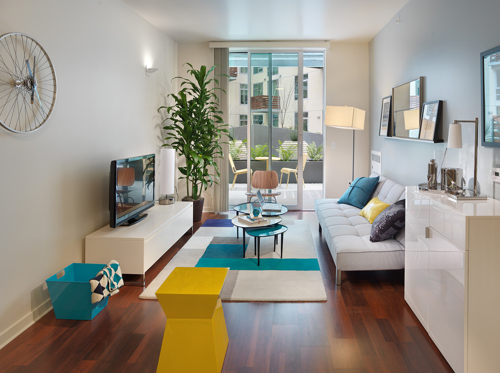 Photo of a contemporary living room in San Francisco with medium hardwood floors.