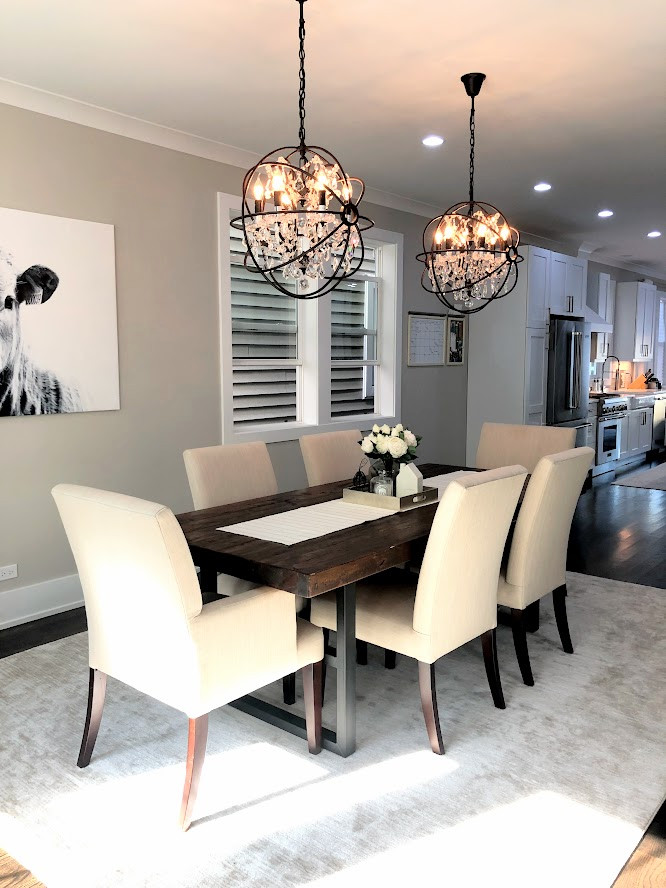 Example of a mountain style dining room design in Chicago