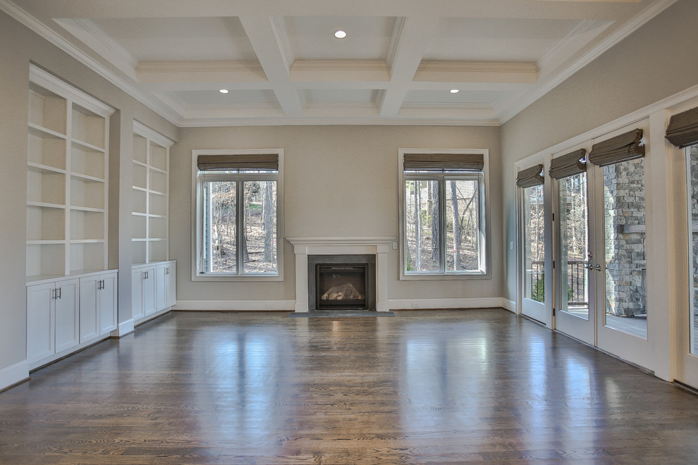 This is an example of a transitional family room in Raleigh.