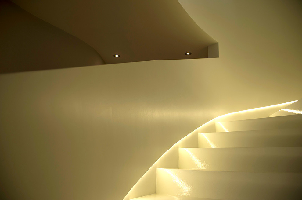 Mid-sized contemporary curved staircase in Other.