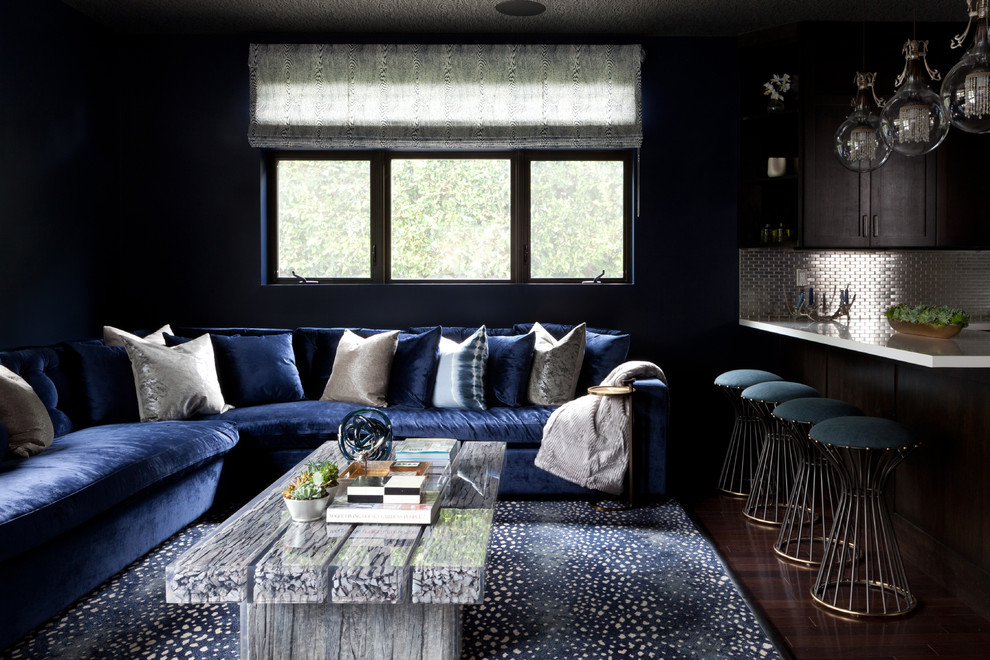 Transitional open concept living room in Los Angeles with blue walls.