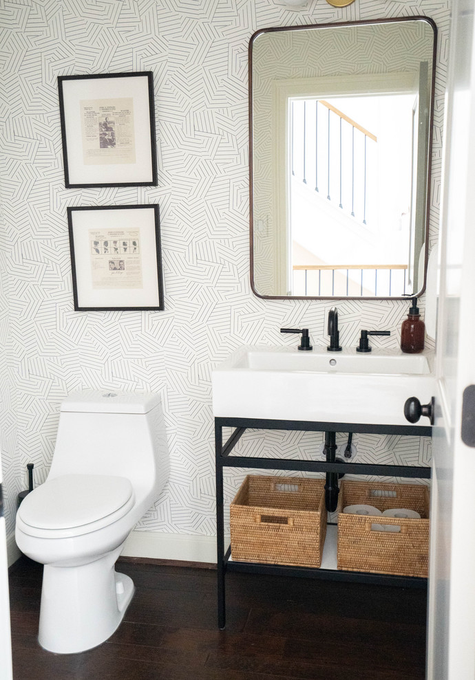 Design ideas for a small transitional powder room in Houston with a one-piece toilet, white walls, dark hardwood floors, a console sink, engineered quartz benchtops, brown floor and white benchtops.